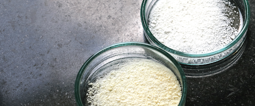 Photo of a couple jars of pvc in powder form