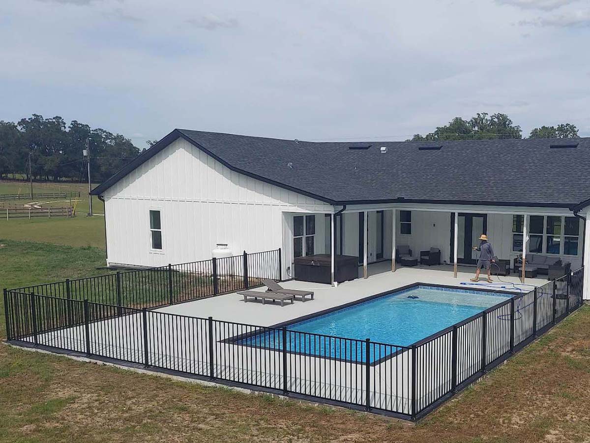 Photo of an aluminum fence surrounding a pool in Ocala, FL