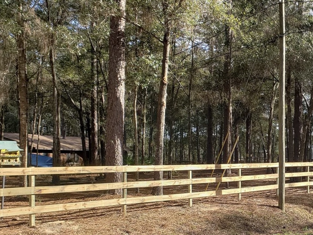 Photo of a post and rail fence from a Ocala Florida fence company